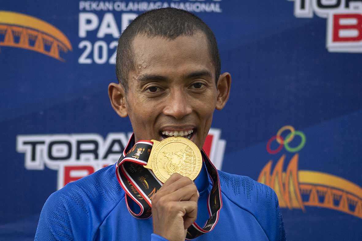 Agus Prayogo Raih Emas Lari 5.000 Meter