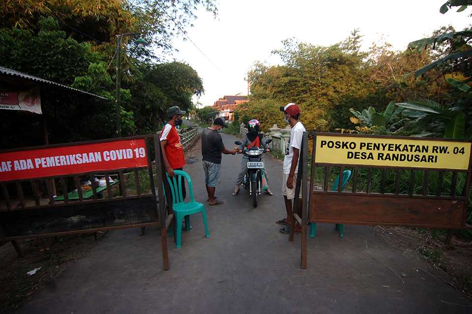 Menutup Pintu Masuk Desa