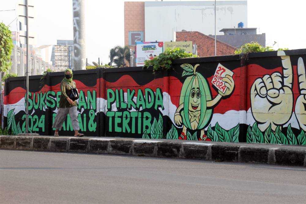 Mural sosialisasi Pilkada serentak