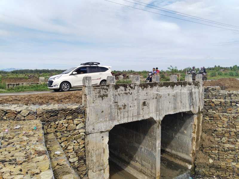 Permudah Akses Warga, PTPN III Perbaiki Jembatan di Gunung Malela