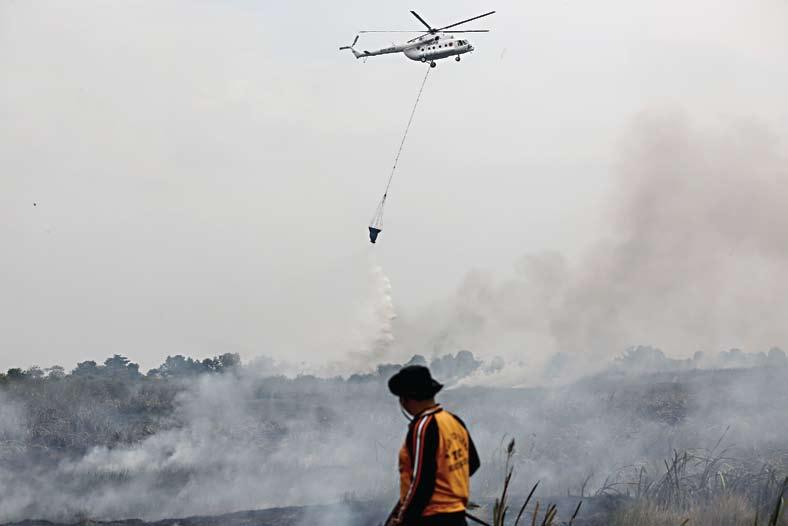 Kota Palembang Diselimuti Kabut Asap