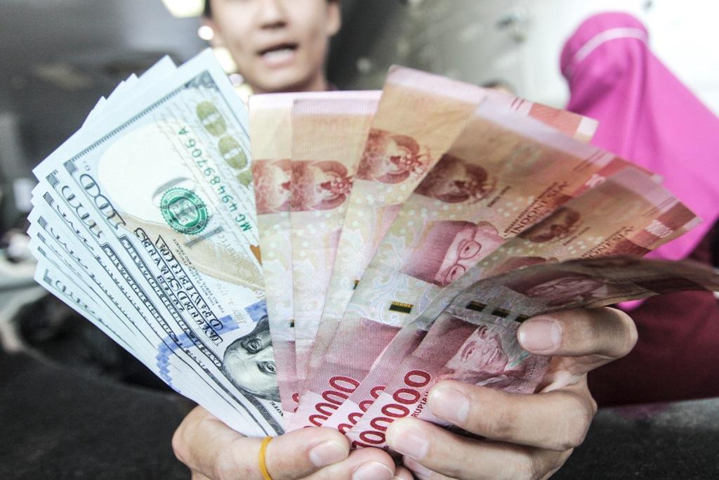 2019, Sentimen Perang Dagang Masih Bayangi Rupiah