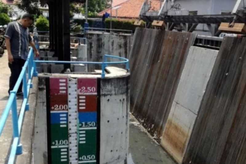 Pintu Air Pasar Ikan Siaga Tiga, Tinggi Muka Air Turun Jakarta Hanya Diguyur Hujan Gerimis