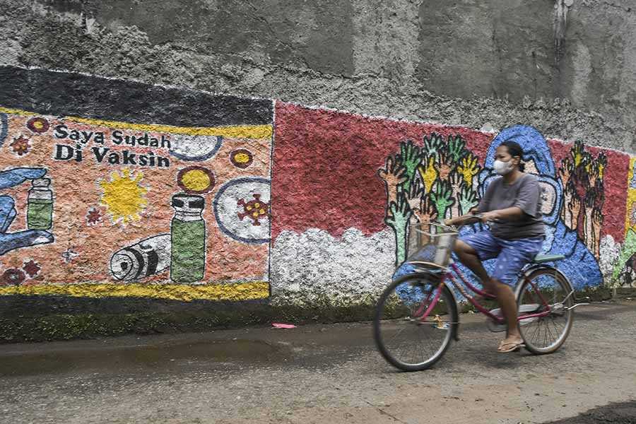 Sosialisasi untuk Vaksinasi Covid-19 Lewat Mural